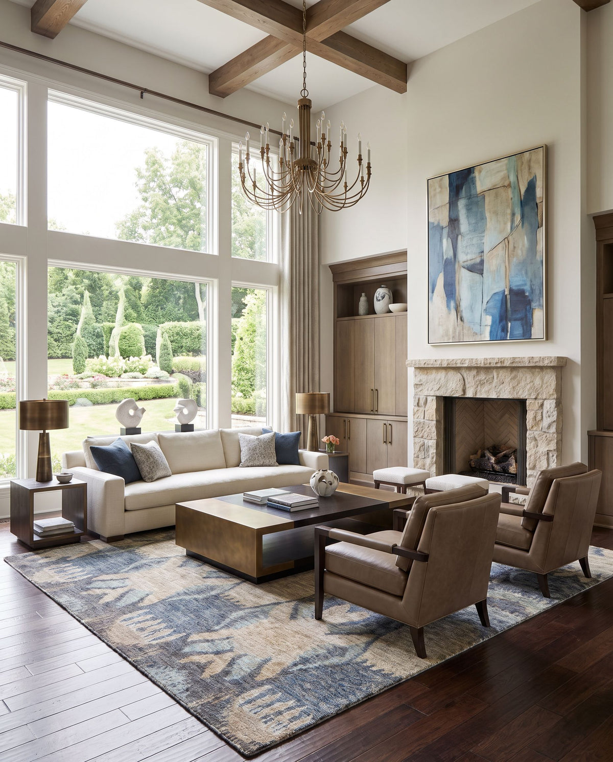Scarborough SCR-5148 Hand Knotted Rug as the centerpiece of a bright luxury living room — a hand knotted rustic area rug in ink blue, blue, medium gray and white tones