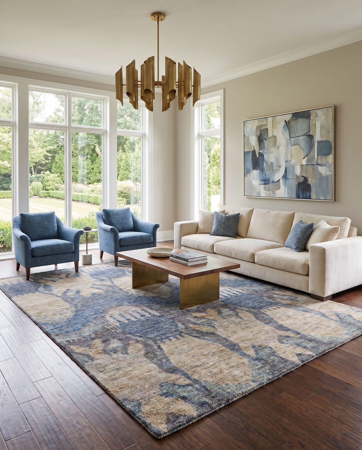 Scarborough SCR-5148 Hand Knotted Rug styled in an elegant designer living room — hand knotted rustic area rug in ink blue, blue, medium gray and white tones