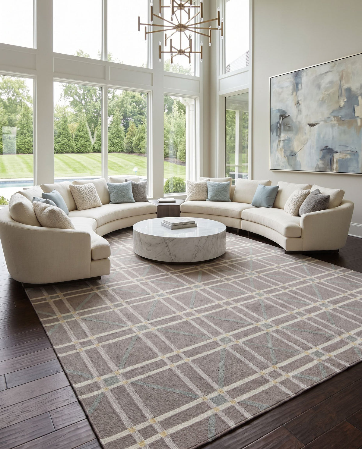Sheffield Market SFM-8008 Hand Woven Rug as the centerpiece of a bright luxury living room — a hand woven modern area rug in mustard, ice blue, gray and ivory tones