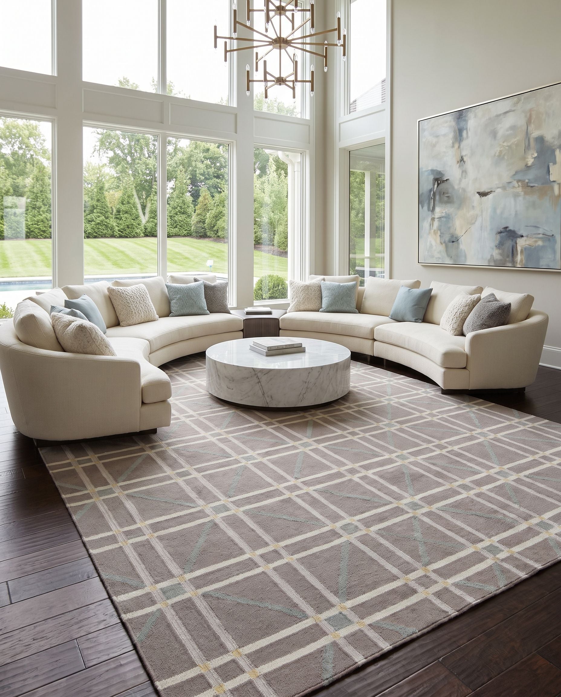 Sheffield Market SFM-8008 Hand Woven Rug as the centerpiece of a bright luxury living room — a hand woven modern area rug in mustard, ice blue, gray and ivory tones