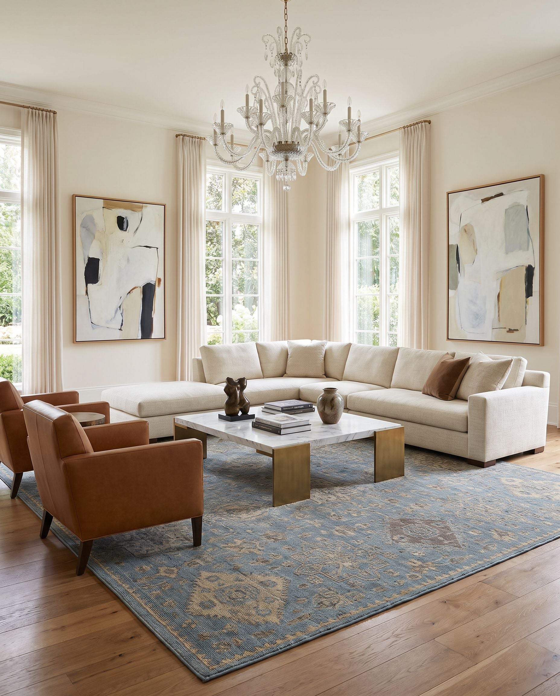 Smyrna SMY-2303 Hand Knotted Rug styled in an elegant designer living room — hand knotted traditional area rug in light blue, medium gray, beige and black tones