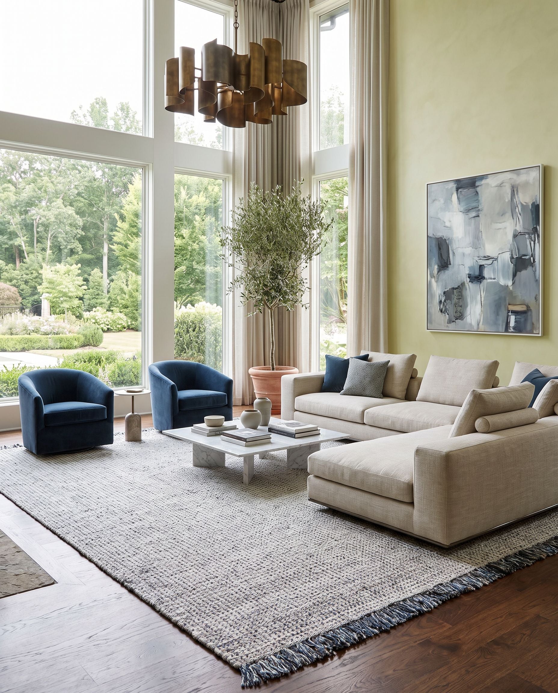 Sara SRU-2304 Hand Woven Rug as the centerpiece of a bright luxury living room — a hand woven modern area rug in off-white, charcoal, brown and seafoam tones