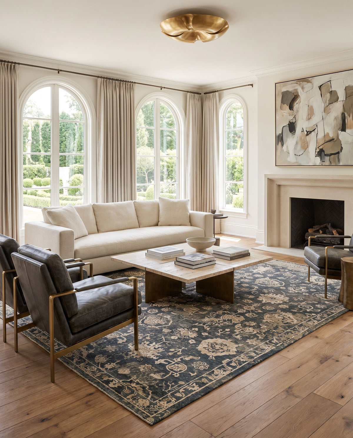 Sufi SUF-2300 Hand Knotted Rug styled in an elegant designer living room — hand knotted traditional area rug in charcoal, tan, taupe and light beige tones