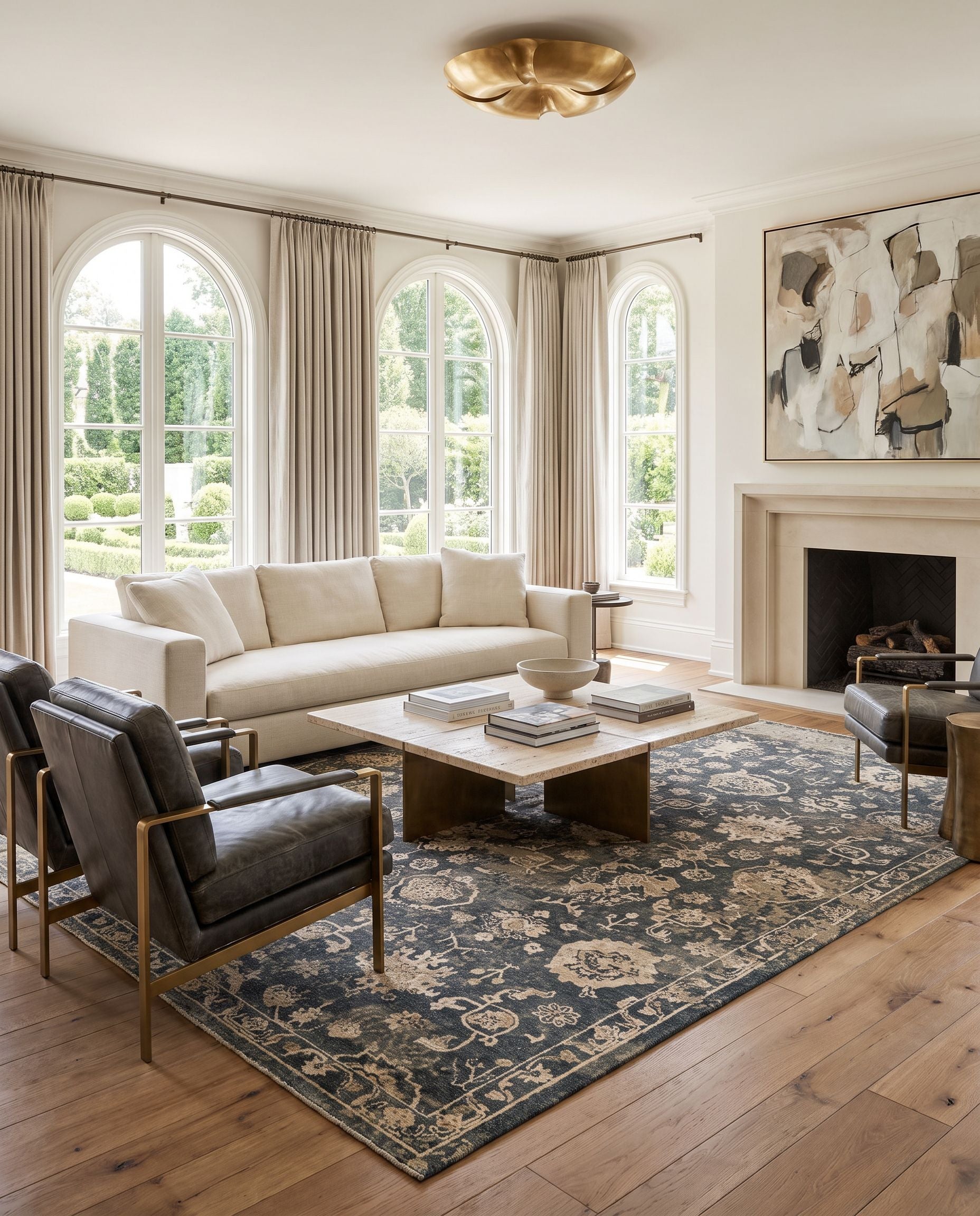 Sufi SUF-2300 Hand Knotted Rug styled in an elegant designer living room — hand knotted traditional area rug in charcoal, tan, taupe and light beige tones