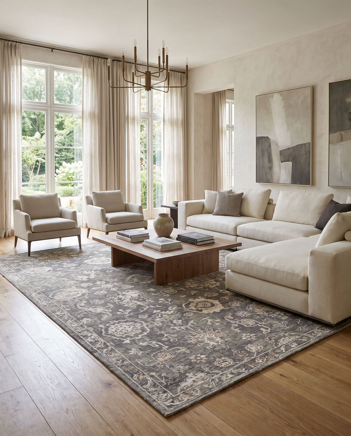 Sufi SUF-2301 Hand Knotted Rug styled in an elegant designer living room — hand knotted traditional area rug in charcoal, taupe, dark brown and light beige tones