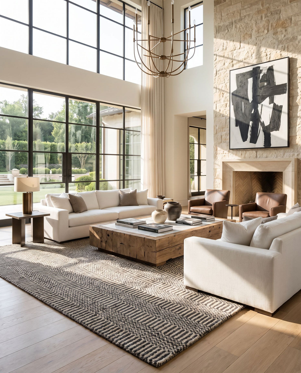 Teton TET-1002 Hand Loomed Rug as the centerpiece of a bright luxury living room — a hand loomed global area rug in deep teal, charcoal and light beige tones