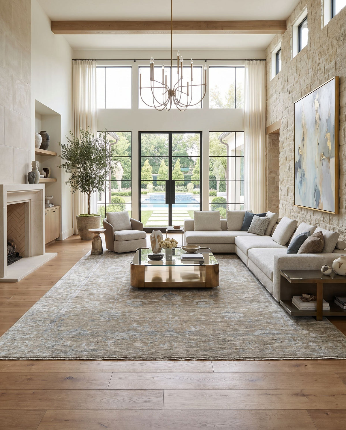 Tabreez TEZ-2300 Hand Knotted Rug as the centerpiece of a bright luxury living room — a hand knotted traditional area rug in medium gray, slate, metallic silver and light sage tones