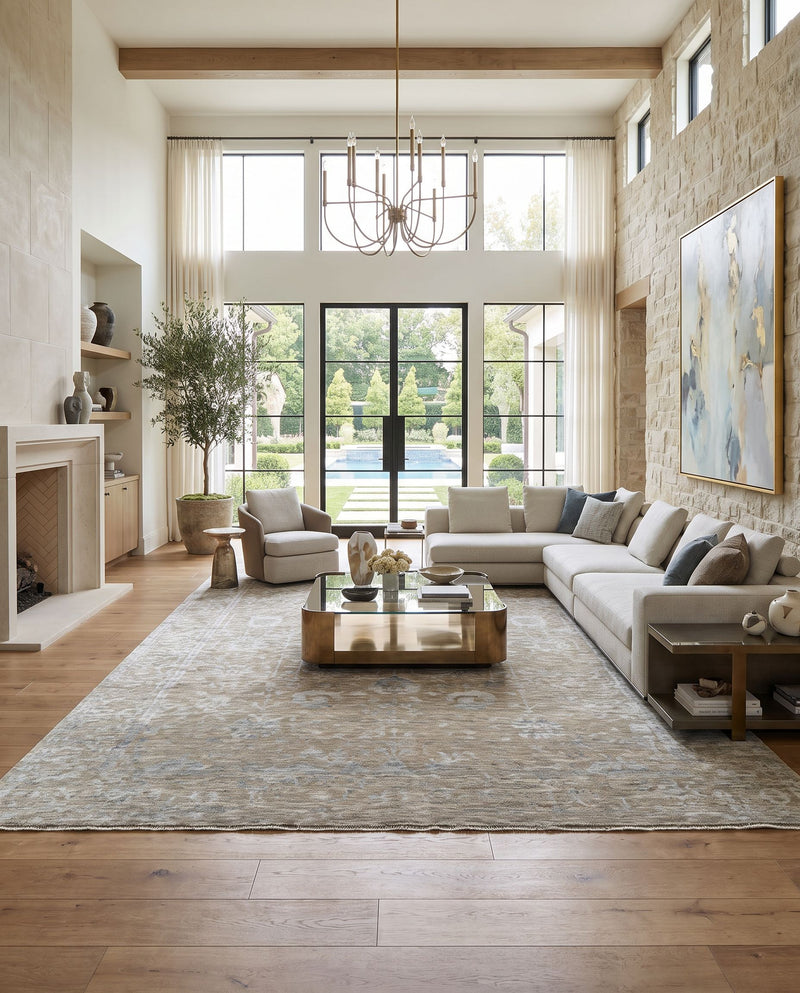 Tabreez TEZ-2300 Hand Knotted Rug as the centerpiece of a bright luxury living room — a hand knotted traditional area rug in medium gray, slate, metallic silver and light sage tones