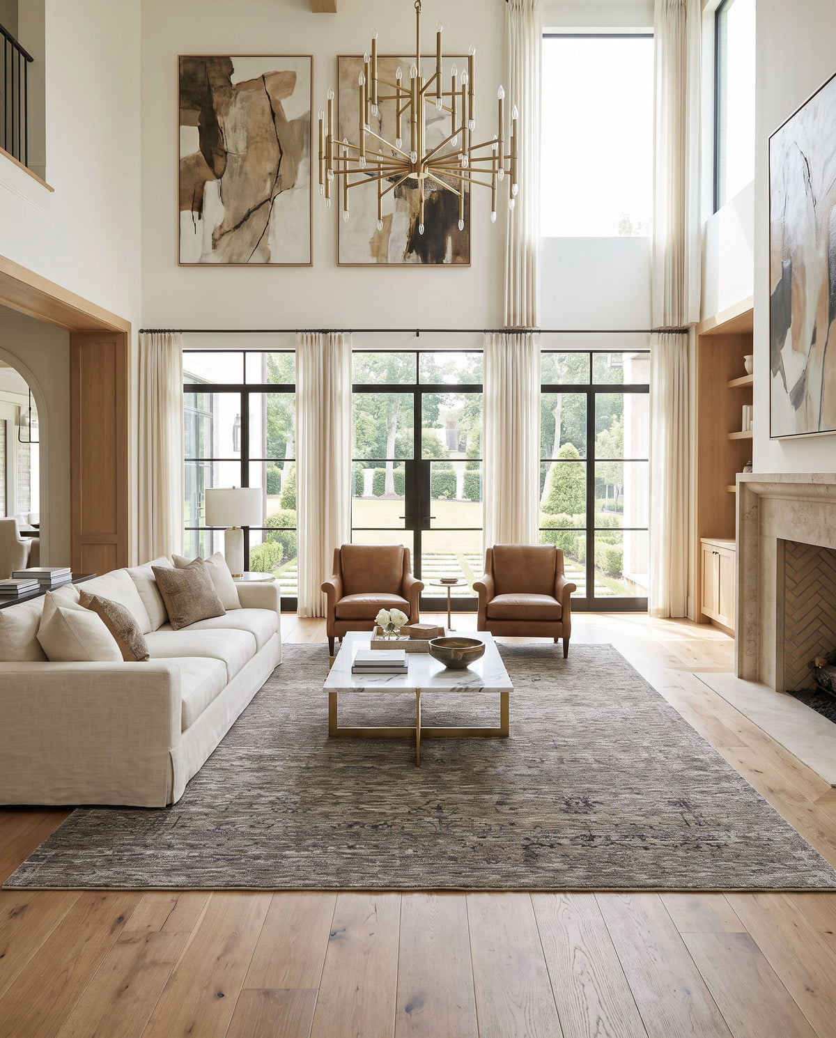 Tabreez TEZ-2301 Hand Knotted Rug styled in an elegant designer living room — hand knotted traditional area rug in black, beige, light gray and dark brown tones