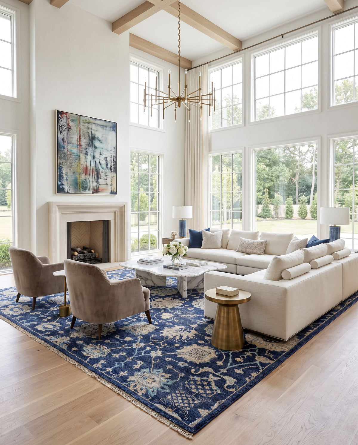 Theodora THO-3007 Hand Knotted Rug as the centerpiece of a bright luxury living room — a hand knotted traditional area rug in navy, charcoal, light slate and aqua tones