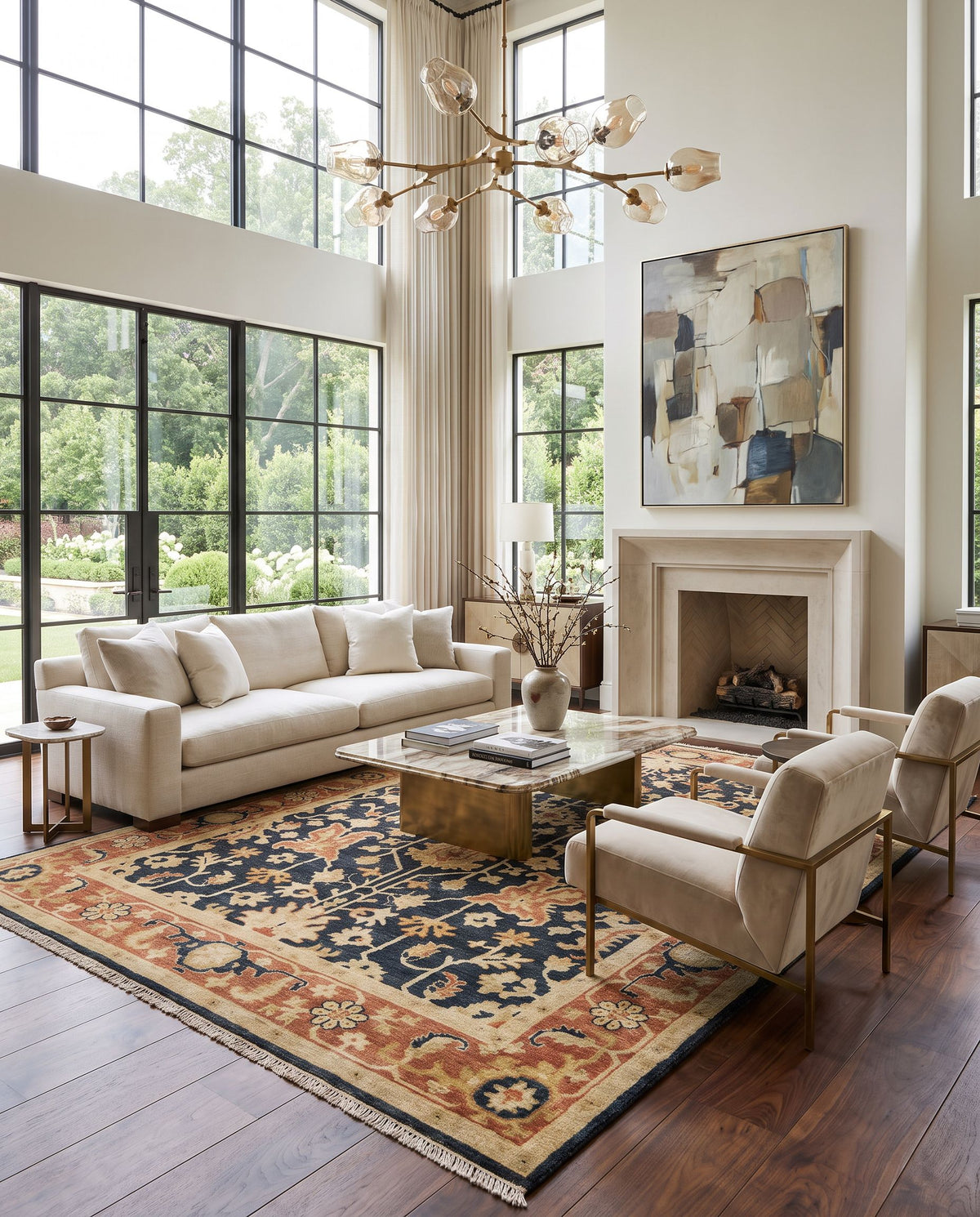 Taj Mahal TJ-6599 Hand Knotted Rug as the centerpiece of a bright luxury living room — a hand knotted traditional area rug in black, burnt orange, tan and mustard tones