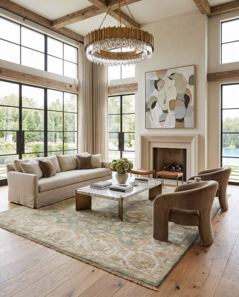 Temptress TMS-3000 Hand Knotted Rug as the centerpiece of a bright luxury living room — a hand knotted traditional area rug in sage, light sage, tan and medium gray tones