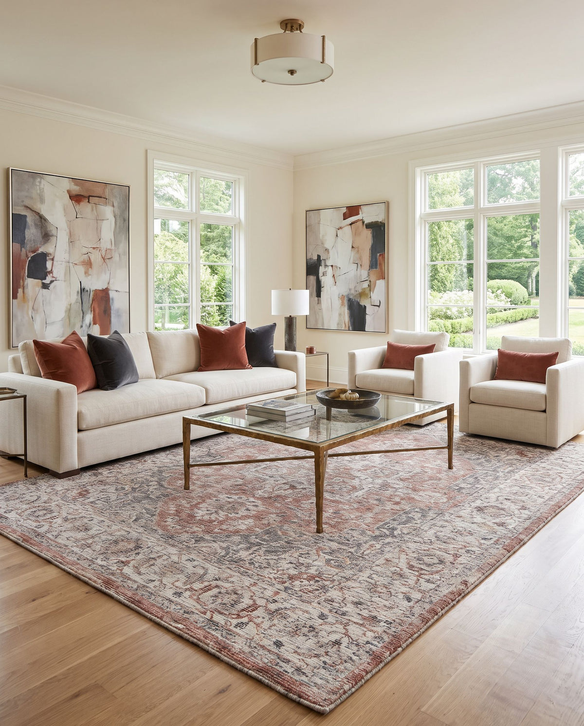 Wilson WSN-2304 Hand Loomed Rug styled in an elegant designer living room — hand loomed traditional area rug in rust, plum, cream and light beige tones