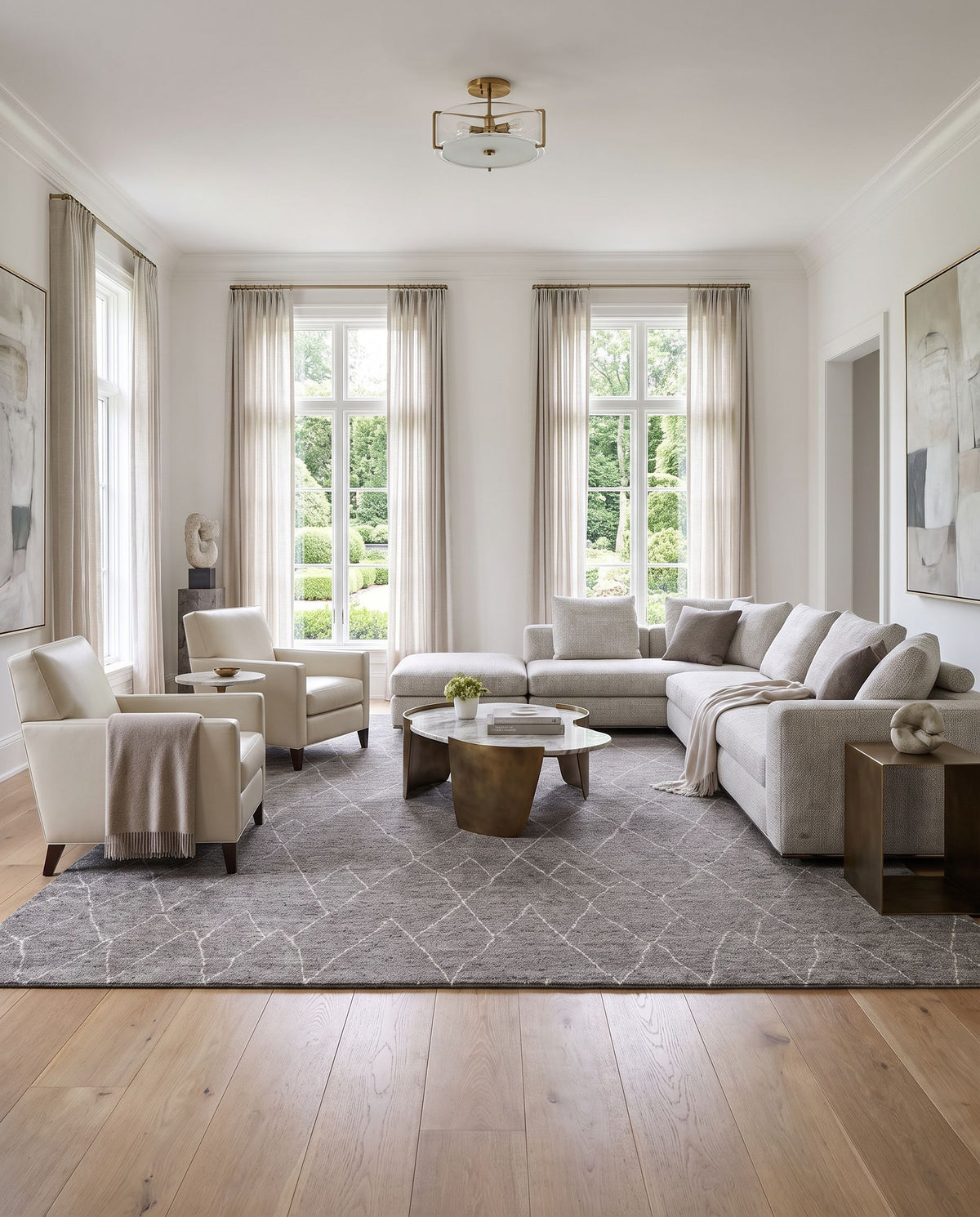 Zara ZAR-2300 Hand Knotted Rug styled in an elegant designer living room — hand knotted global area rug in charcoal, black, brown and cream tones