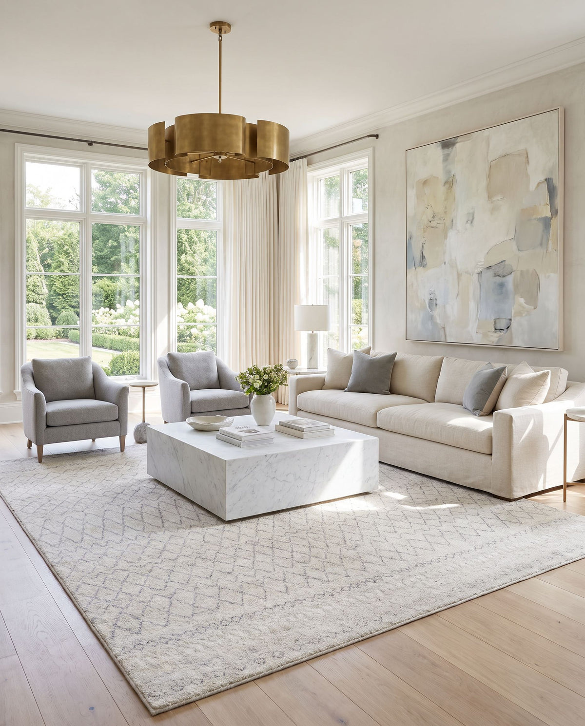 Zara ZAR-2306 Hand Knotted Rug styled in an elegant designer living room — hand knotted global area rug in light gray, gray and medium gray tones
