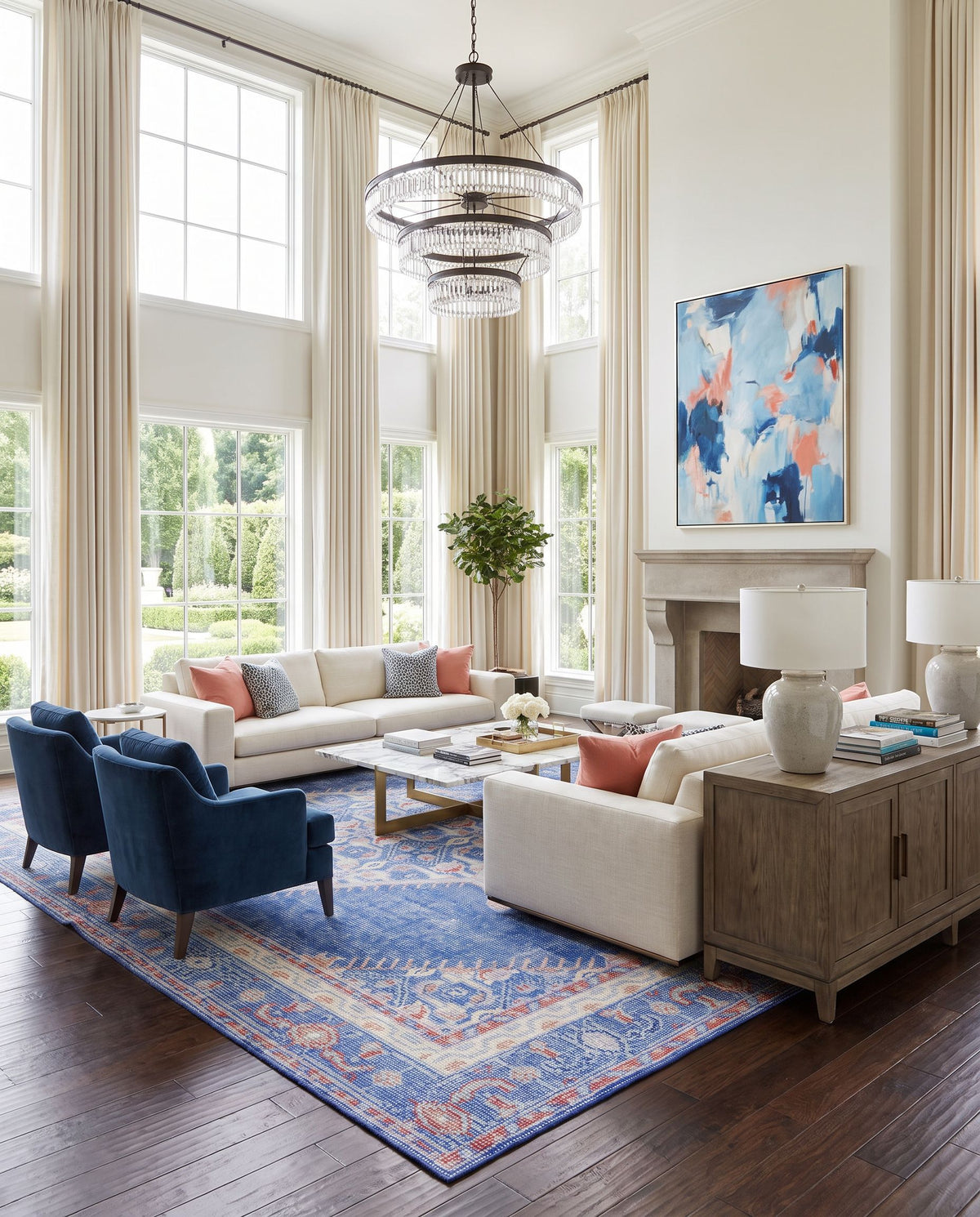 Zahra ZHA-4003 Hand Knotted Rug as the centerpiece of a bright luxury living room — a hand knotted traditional area rug in dark blue, red, lilac and rust tones