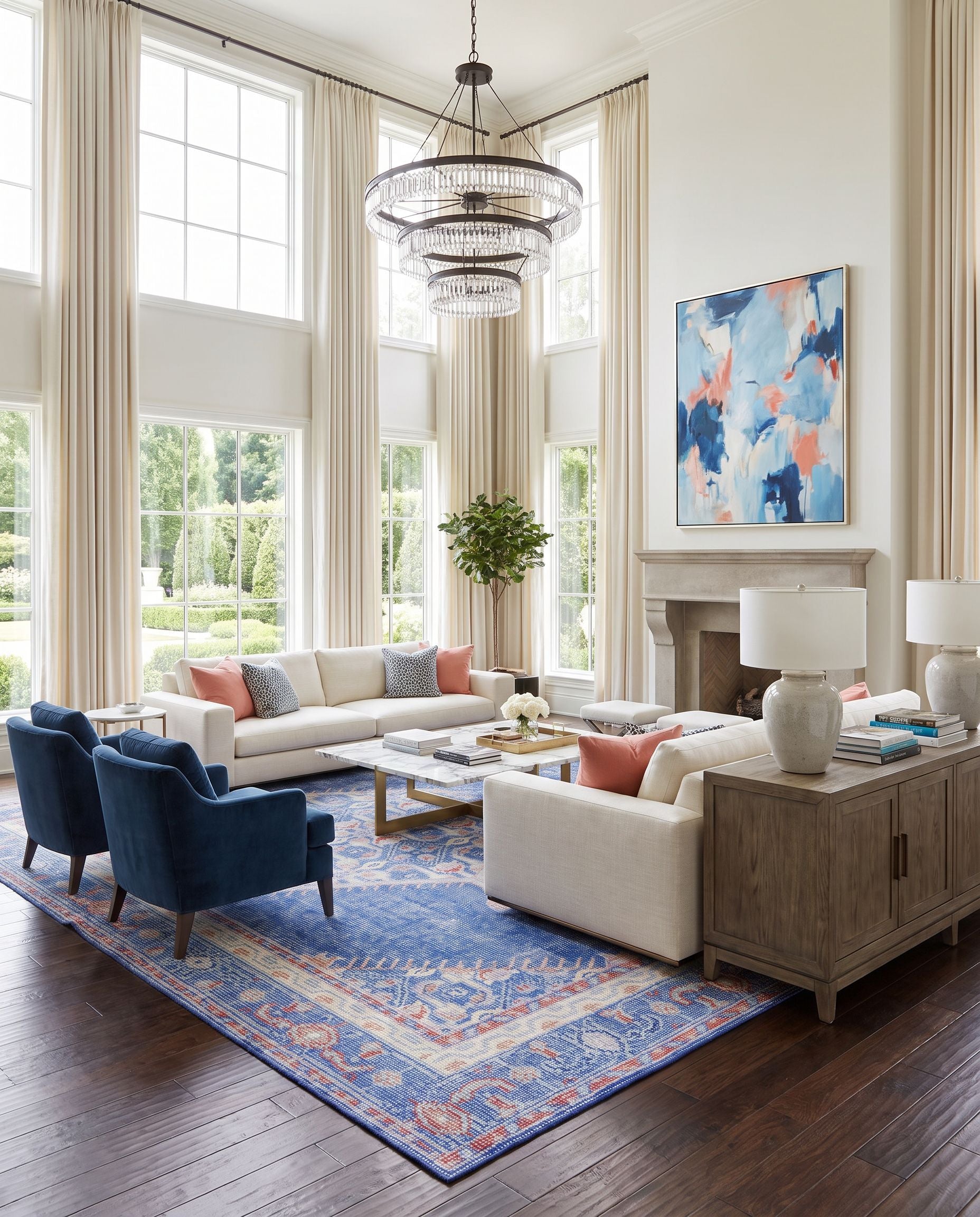 Zahra ZHA-4003 Hand Knotted Rug as the centerpiece of a bright luxury living room — a hand knotted traditional area rug in dark blue, red, lilac and rust tones