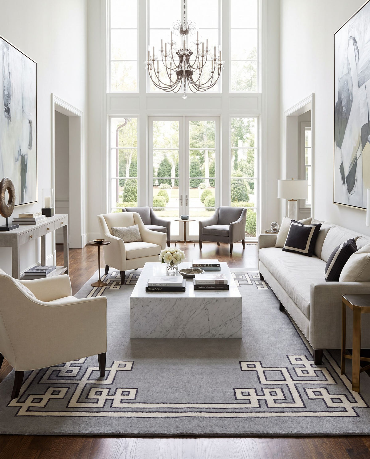 Alameda AMD-1019 Hand Woven Rug as the centerpiece of a bright luxury living room — a hand woven modern area rug in gray, light gray and ink blue tones